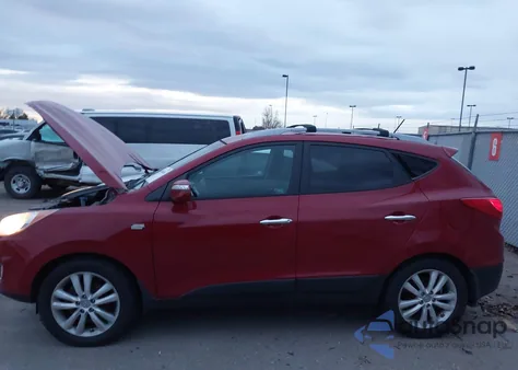 2012 Hyundai Tucson Limited from USA, damaged, VIN KM8JUCAC3CU381323